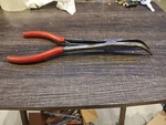 Mac Tools P301733 11" Extended Reach Bent Tip Needle Nose Pliers Spring Action. Fixed Price $22.45.