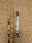 Mac Tools 3/8"-7/16" 12PT Sae Offset Reversible Ratcheting Box Wrench ROW12142. Fixed Price $7.98.