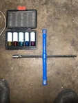 Adjustable 4 Way Crossbar/lugnut Wrench & Impact Sockets. Fixed Price $35.00.